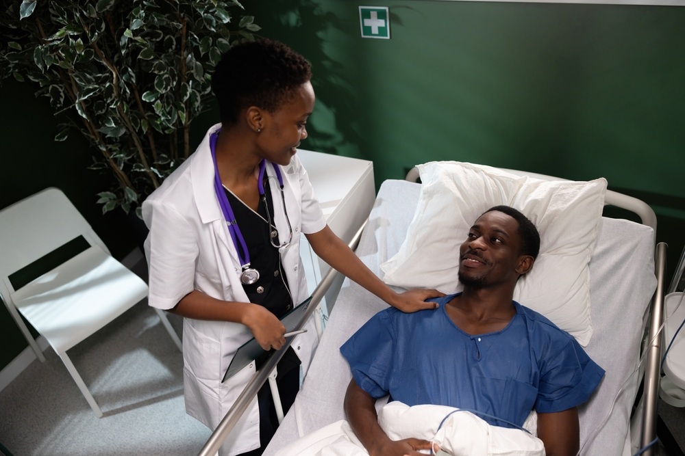 Kagio Hospital doctor reassuring a patient during consultation
